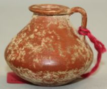 A Greek Attic redware small jar, of angular form with a single looped handle to the neck, 4.7cm