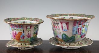 Two Chinese Canton-decorated flower pots, 19th century, each typically painted with figures amid