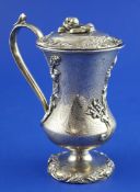 A mid 19th century Russian 84 zolotnik silver cup and cover, of waisted form, decorated with