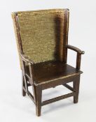 A small Liberty & Co stained pine and woven straw Orkney chair, label to base