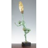 A French Art Deco green patinated figural table lamp, modelled as a female dancer standing on one