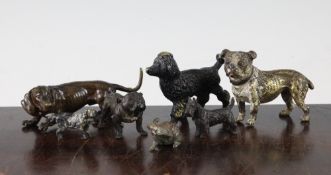 A small cold painted bronze model of a Bulldog, together with five other cold painted bronze dogs,