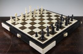 A Continental turned ivory and horn chess set, c.1920-30, complete with thirty two pieces, with 3.