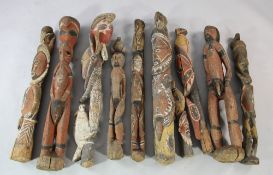 Papua New Guinea Sepik River, a collection of seven ancestor house post figures, variously carved