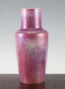 A Ruskin pottery high fired flambe vase, c.1916, of tapering rouleau form, glazed in iridescent