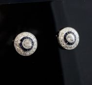 A pair of white gold, sapphire and diamond cluster target ear studs, with an estimated total diamond