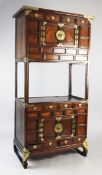 A Korean elm and brass mounted cabinet, fitted with various drawers and cupboard with central open