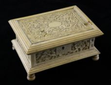 A Chinese ivory casket, late 19th century, carved in relief with birds amid prunus branches, the