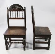 A pair of late 17th century North Cheshire / South Lancashire oak backstools, with spindle turned