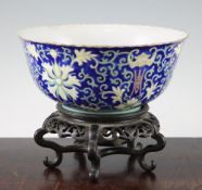 A Chinese blue ground porcelain bowl, Qianlong mark, late 19th / early 20th century, painted with