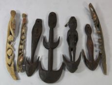 Papua New Guinea Sepik River, a collection of seven food hooks and hook masks, variously carved