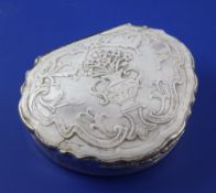 A 19th century silver and shell mounted snuff box, of shaped cartouche form, with engine turned