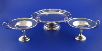 A matched pair of Edwardian silver comports, with loop handles, Goldsmiths & Silversmiths Co Ltd,