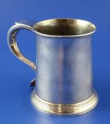 A late George II silver mug, with initialled scroll handle, William Shaw & William Priest, London,