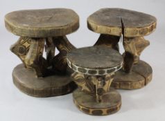 Papua New Guinea Sepik River, two tribal tables, each carved from a single section of tree trunk,