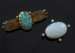 An Edwardian gold, white opal and diamond set pendant brooch, with toothed border set with four