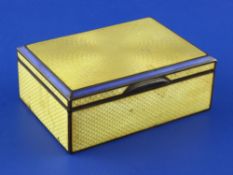 A 1920's continental silver and yellow guilloche enamel mounted rectangular cigarette box, with blue