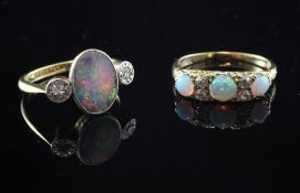An early 20th century 18ct gold and platinum, black opal and two stone diamond ring, size L,