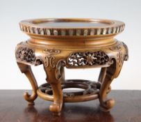 A Japanese boxwood and rosewood stand, Meiji period, the frieze inset with abalone flutes, the