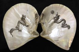 A Chinese silver mounted mother of pearl shell, early 20th century, hinged in two halves, and