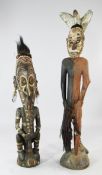 Two Papua New Guinea Sepik River large carved wood male ancestor figures, with incised and