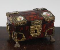 A late 19th century rectangular tortoiseshell table casket, with gilt brass mounts and oval