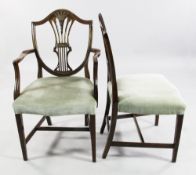 A set of ten late 19th century Hepplewhite style mahogany dining chairs, two with arms and eight