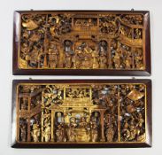 A pair of Chinese carved giltwood panels, late 19th / early 20th century, each carved in high relief