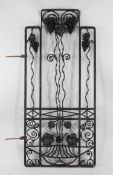 A French wrought iron openwork gate, in the manner of Edgar Brandt, decorated with grapes and