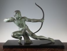 A French Art Deco patinated metal model of a male archer, on a rectangular polished marble base,