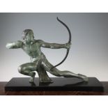 A French Art Deco patinated metal model of a male archer, on a rectangular polished marble base,