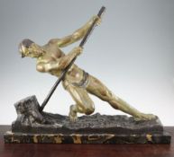 Alexandre Ouline (Belgian). An Art Deco patinated metal figure of a man working a tree stump, marked
