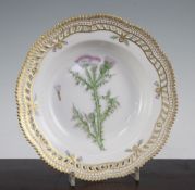 A Royal Copenhagen Flora Danica soup dish, painted to the centre with a titled specimen 'Carduus