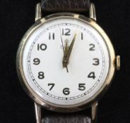 A gentleman's 1950's? gold Tudor manual wind wrist watch, with Arabic dial, on later associated