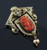 A Victorian gold, split pearl, black enamel and coral set drop pendant brooch, the coral panel