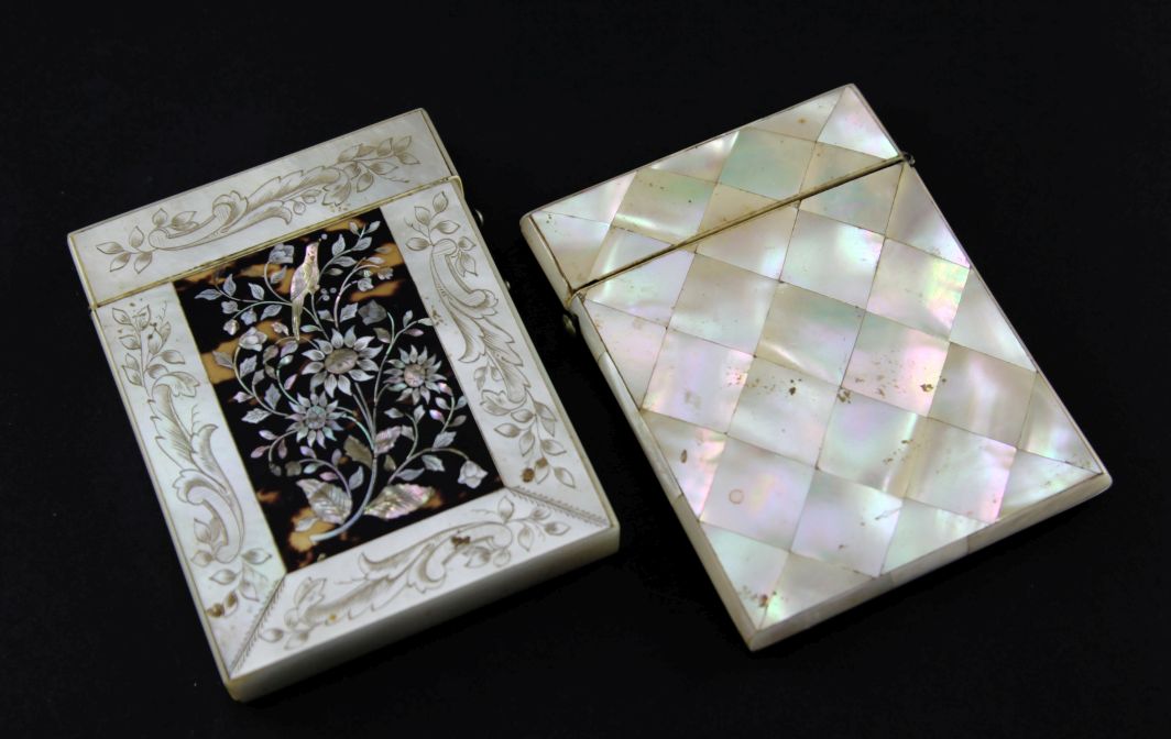A Victorian engraved mother of pearl card case, the rectangular tortoiseshell panels inlaid with
