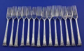A matched set of fourteen George III silver Onslow pattern dessert forks, various dates and