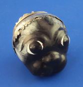 A 19th century French? silver mounted painted enamel bonbonniere modelled as the head of a Pug,