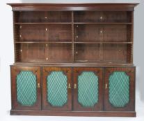A 19th century mahogany bead moulded and ebony line inlaid bookcase, the two division open top