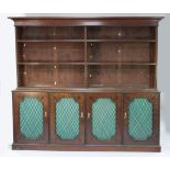 A 19th century mahogany bead moulded and ebony line inlaid bookcase, the two division open top