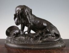 A late 19th century French patinated bronze figure group of a female Bassett hound and puppies, on