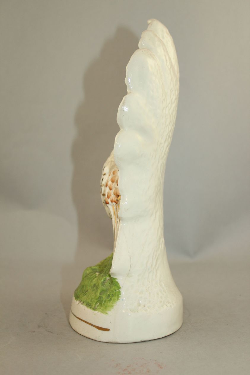 An unusual Staffordshire pottery flatback peacock figure, mid 19th century, the plumage of the - Image 3 of 6