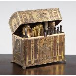 An early 19th century French gilt brass necessaire, with bright cut decoration depicting musical