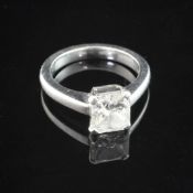 A platinum and solitaire diamond ring, with Belson & Sykes Ltd valuation assessing the radiant cut