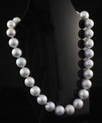 A single strand graduated silver grey cultured Tahitian pearl style necklace, with gold plated