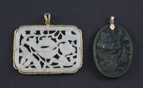 Two Chinese jade plaques, the first of grey-white jade pierced and carved with flowers, lingzhi