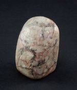 A Chinese soapstone scholar's seal, of boulder form, engraved with rockwork and trees and an