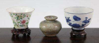 Two Chinese porcelain cups and a small crackle glaze vase, 17th - 19th century, the late Ming blue