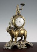 A French bronze mantel timepiece modelled as a Chinaman riding an elephant, with eight day movement,