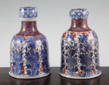 Two Chinese underglaze blue and iron red enamelled bell shaped huqqa bases, Kangxi period, each